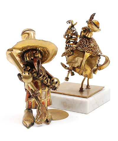 Botterweg Auctions Amsterdam > Two brass fantasy sculptures